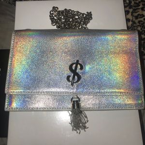 Iridescent purse with money sign on it